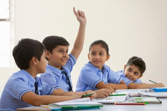 Students participating actively in a classroom lesson