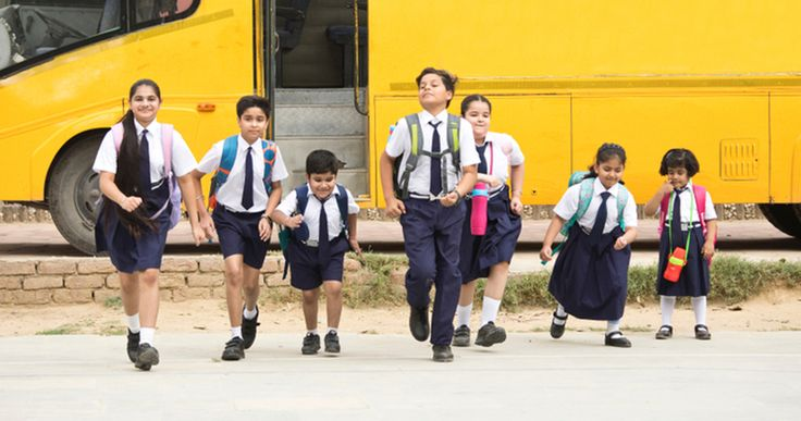 Students arriving at school by bus